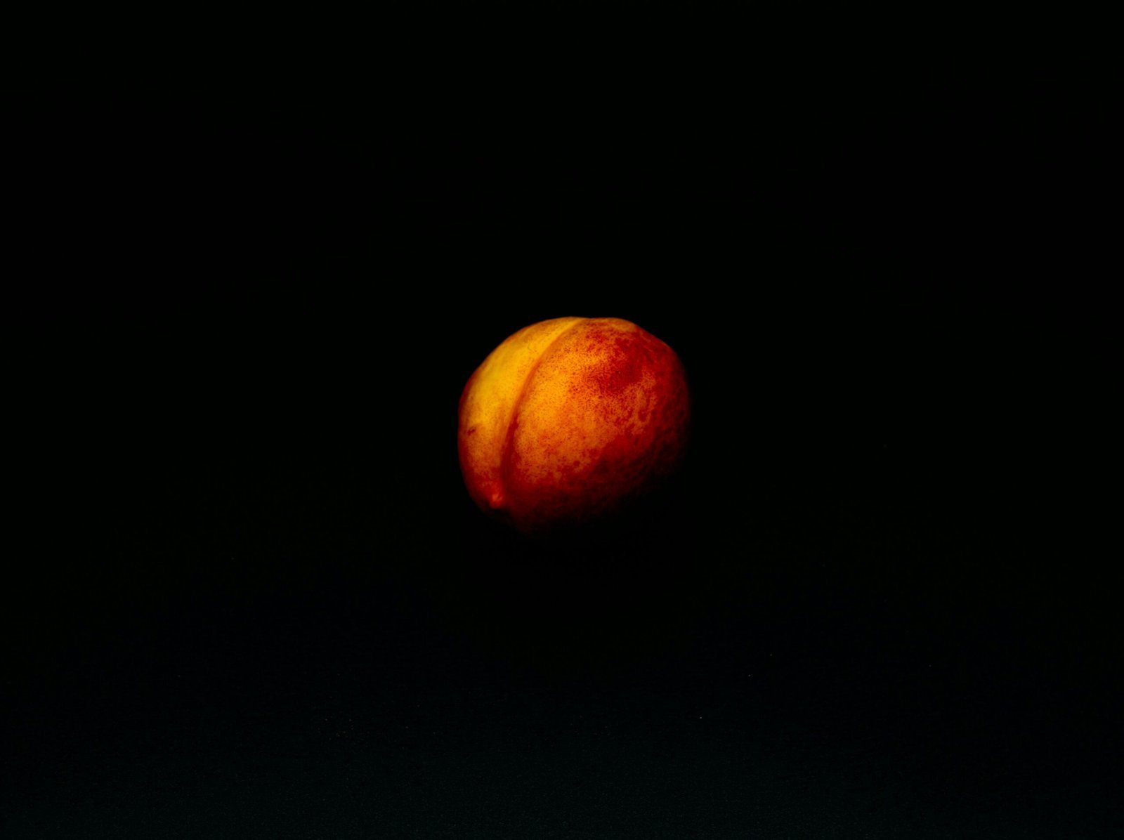 red and yellow round fruit