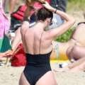 Candice Swanepoel puts on cheeky display as she enjoys fun in the sun