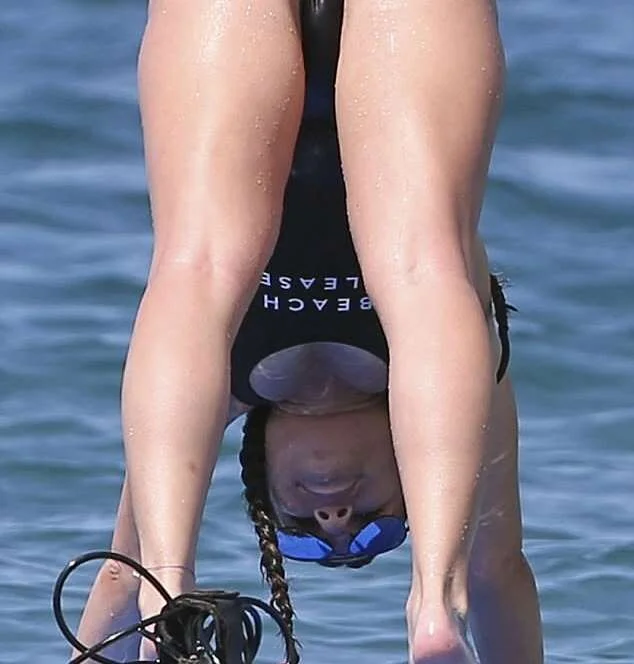 Viral Cheeks-#Lea #Michele #flashes #cleavage #plunging #pink #swimsuit
